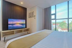 TV a/nebo společenská místnost v ubytování Hamersons Hotel CDO
