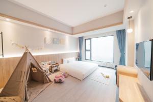 TV a/nebo společenská místnost v ubytování Hotel Liyaou
