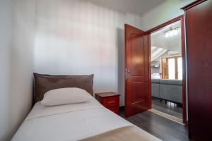 Postel nebo postele na pokoji v ubytování Hotel Castle