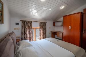 Postel nebo postele na pokoji v ubytování Hotel Castle