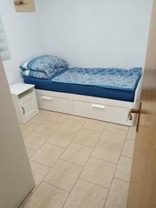 Postel nebo postele na pokoji v ubytování Apartman Pajo