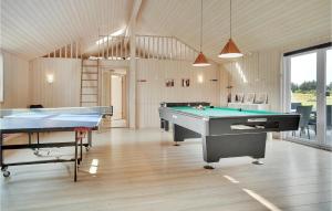 a billiard room with two ping pong tables at Lovely Home In Løkken With Wifi in Løkken