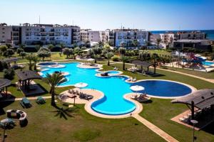 Bazén v ubytování Apartment in Thalassa Beach Resort & Spa Retreat nebo v jeho okolí