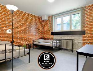 Posteľ alebo postele v izbe v ubytovaní Hostel na Šalamouně