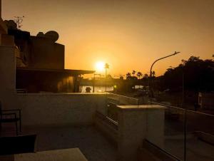The sunrise or sunset as seen from Az apartmant or nearby
