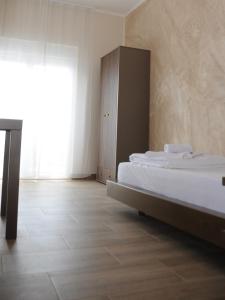 Letto o letti in una camera di Sobe Sova Kikinda