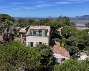 an aerial view of a house with trees at La Cabane des Salants la Capte Presqu'île de Giens in Hyères