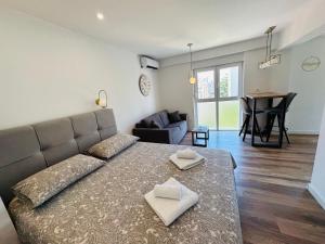 a living room with a couch and a table at Apartment Mara&Padrona in Zadar