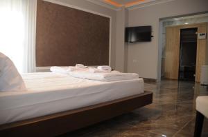 Letto o letti in una camera di Sobe Sova Kikinda
