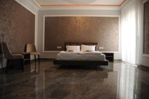 Letto o letti in una camera di Sobe Sova Kikinda