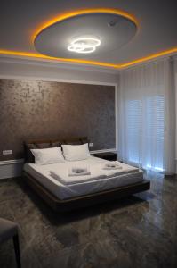 Letto o letti in una camera di Sobe Sova Kikinda
