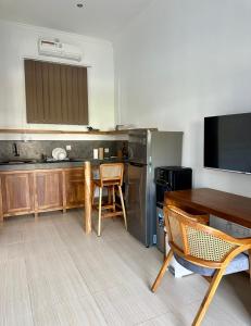 TV a/nebo společenská místnost v ubytování Nomada Villas