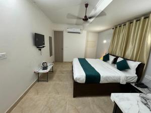 Postel nebo postele na pokoji v ubytování Airport Hotel Annexe + 7 fotografií