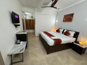 TV a/nebo společenská místnost v ubytování Airport Hotel Annexe