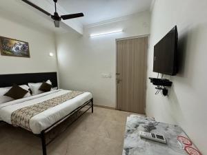Postel nebo postele na pokoji v ubytování Airport Hotel Annexe