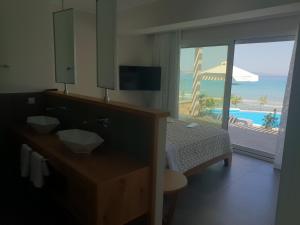 Fotografie z fotogalerie ubytování Paralia Luxury Suites v destinaci Agios Stefanos