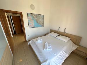 Postel nebo postele na pokoji v ubytování Apartment Visum