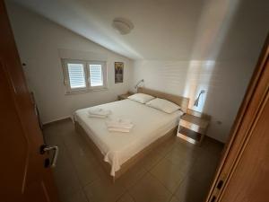 Postel nebo postele na pokoji v ubytování Apartment Visum