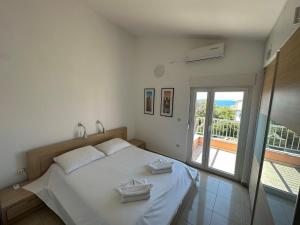 Postel nebo postele na pokoji v ubytování Apartment Visum