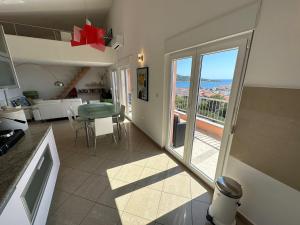 Kuchyň nebo kuchyňský kout v ubytování Apartment Visum