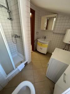 Koupelna v ubytování Apartment Visum