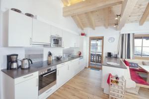 Köök või kööginurk majutusasutuses Grünerstein Chalet Jungbrunnen