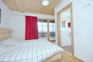 Voodi või voodid majutusasutuse Grünerstein Chalet Jungbrunnen toas