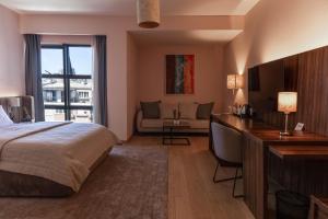 Postel nebo postele na pokoji v ubytování Hotel Sirius + 37 fotografií