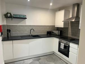 Η κουζίνα ή μικρή κουζίνα στο 5 Halifax House, apartment 3