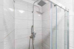 Kúpeľňa v ubytovaní Sienkiewicza Blue Apartment
