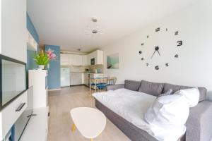 Kuchyňa alebo kuchynka v ubytovaní Sienkiewicza Blue Apartment