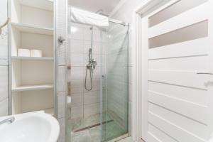 Kúpeľňa v ubytovaní Sienkiewicza Blue Apartment