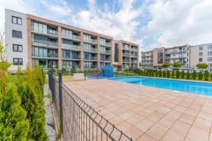 Bazén v ubytovaní Sienkiewicza Blue Apartment alebo v jeho blízkosti