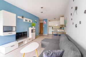 Kuchyňa alebo kuchynka v ubytovaní Sienkiewicza Blue Apartment