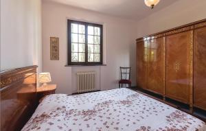 A bed or beds in a room at Nice Apartment In Marti Pi With Wifi