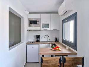 Η κουζίνα ή μικρή κουζίνα στο Thyme House