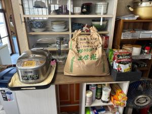 Cucina o angolo cottura di 海と西一棟貸し宿