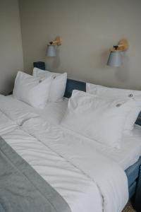 Postel nebo postele na pokoji v ubytování RUBEL APARTHOTEL&SPA