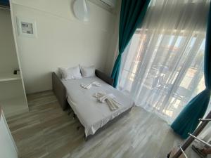 Sunny Beach Potos客房内的一张或多张床位