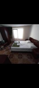 Giường trong phòng chung tại Casa Anca