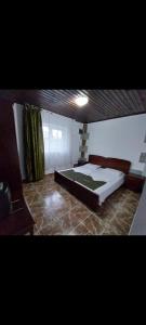 Giường trong phòng chung tại Casa Anca