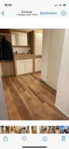 a picture of a kitchen with a wooden floor at Haus Leona in Teufenbach +1 photo