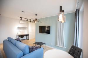 Televízia a/alebo spoločenská miestnosť v ubytovaní Rent40 Apartamenty Aura 2 Gdańsk Old Town