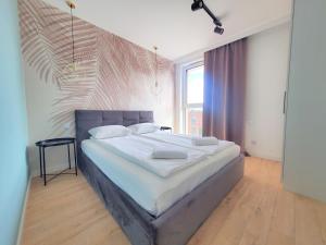 Posteľ alebo postele v izbe v ubytovaní Rent40 Apartamenty Aura 2 Gdańsk Old Town