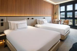 Кровать или кровати в номере Hotel Meliá Bilbao