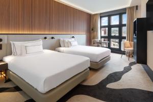 Кровать или кровати в номере Hotel Meliá Bilbao