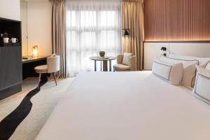 Кровать или кровати в номере Hotel Meliá Bilbao