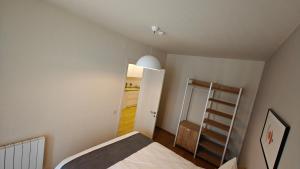 Postel nebo postele na pokoji v ubytování N209 Apartment In Bakuriani