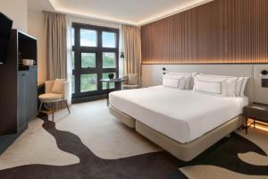 Кровать или кровати в номере Hotel Meliá Bilbao
