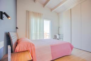 Postel nebo postele na pokoji v ubytování VillaMar Residence